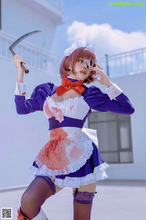 A woman in lingerie holding a scythe in her hand.