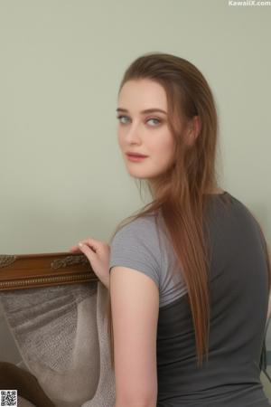 A woman sitting on a chair with her legs crossed.